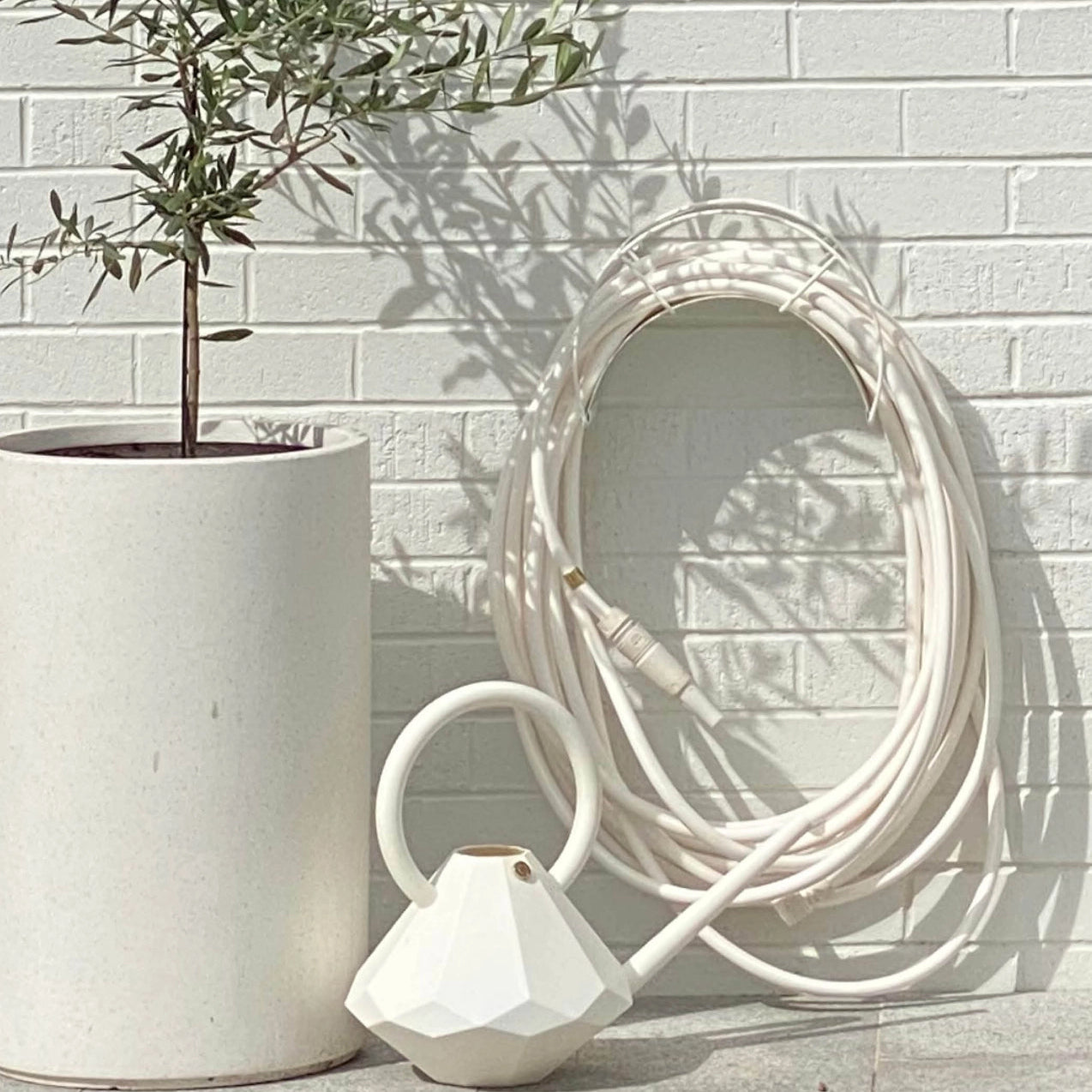White Snake Hose Holder