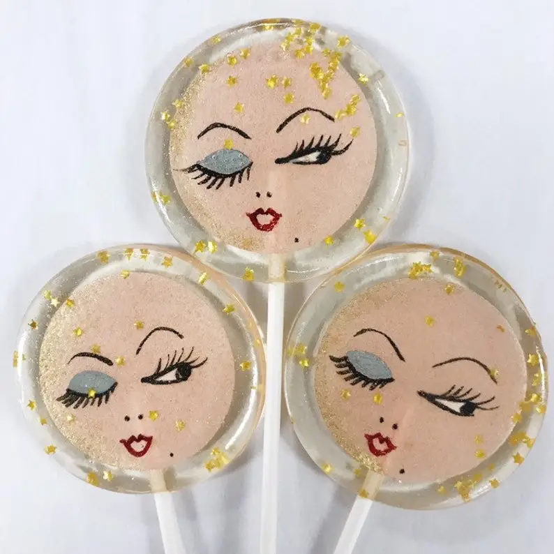 Fondant Pink Winking Moon Lollipops